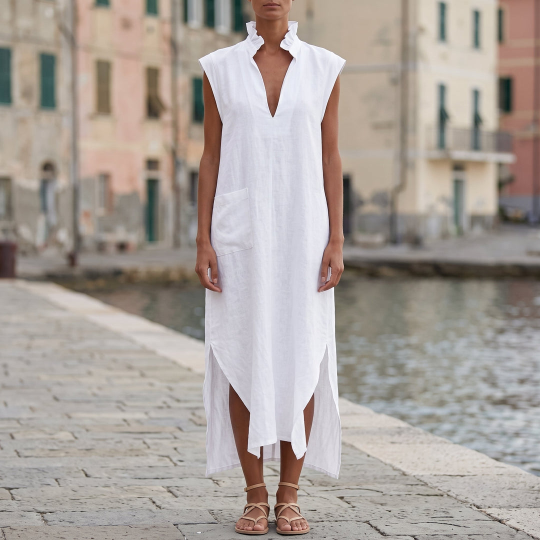Abito camicia smanicato a silhouette ampia, lunghezza media, visto frontalmente