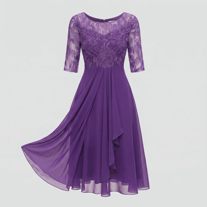 Abito midi indossato, con gonna in tulle che mostra il movimento