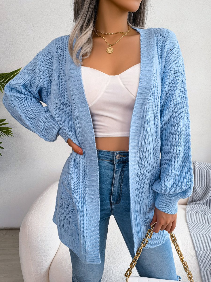 Vista posteriore del cardigan oversize a maglia grossa