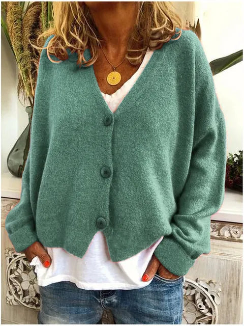Cardigan a maglia fine con scollo a V e chiusura frontale a bottoni, lunghezza al fianco