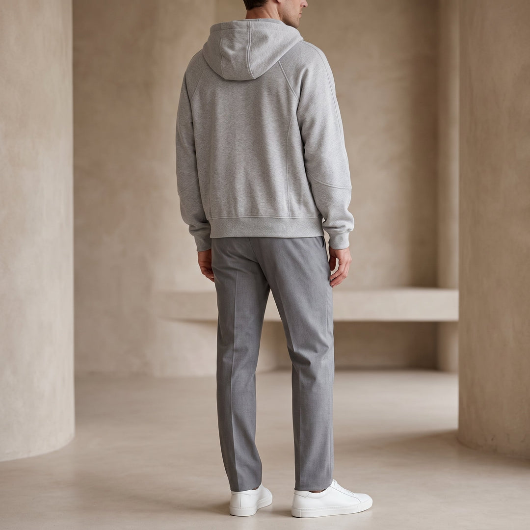 Dettaglio della doppia zip frontale del cardigan da uomo