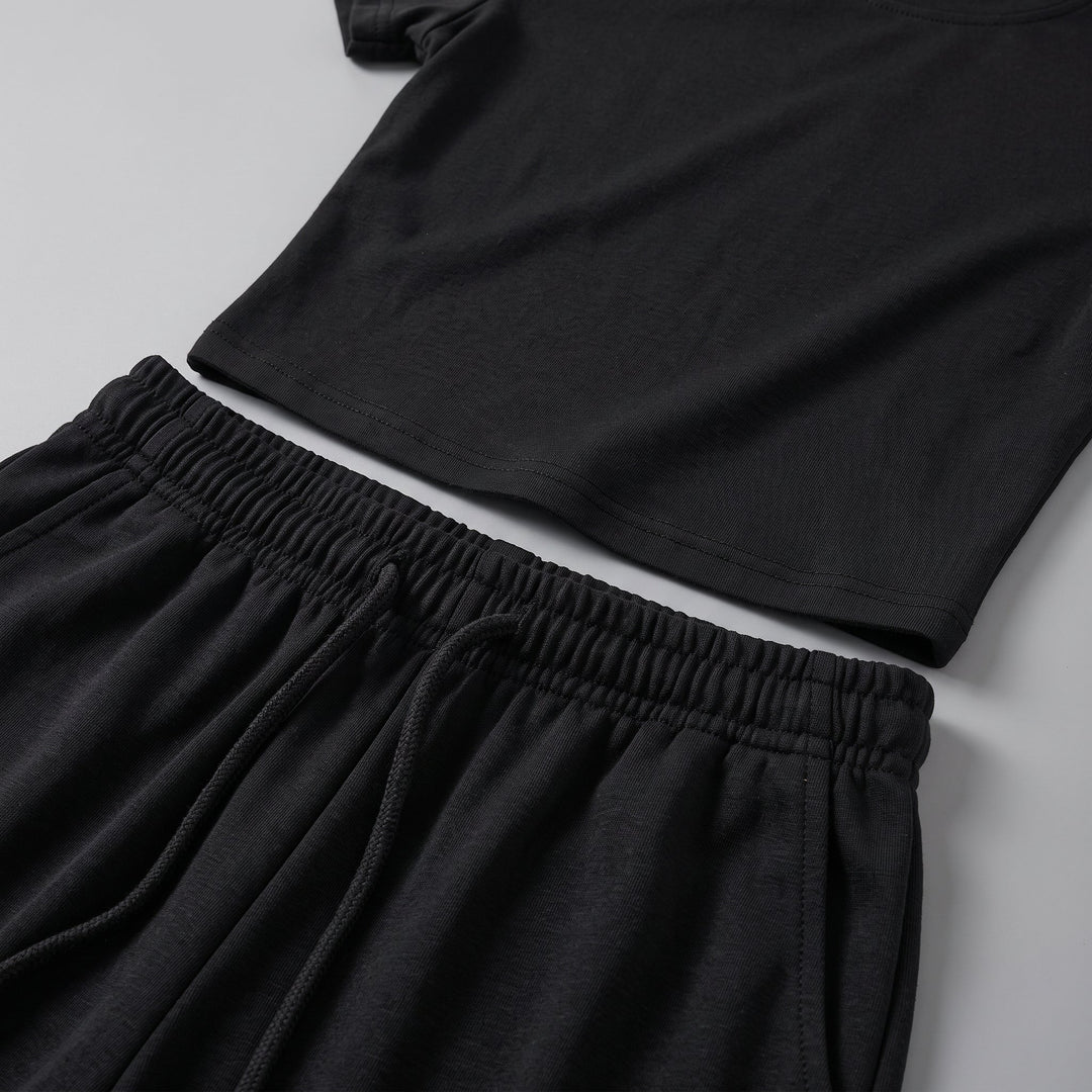 Completo due pezzi da donna con top arricciato e pantalone a gamba larga