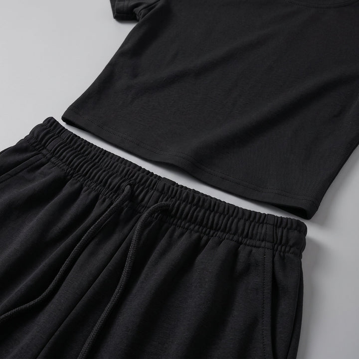 Completo due pezzi da donna con top arricciato e pantalone a gamba larga