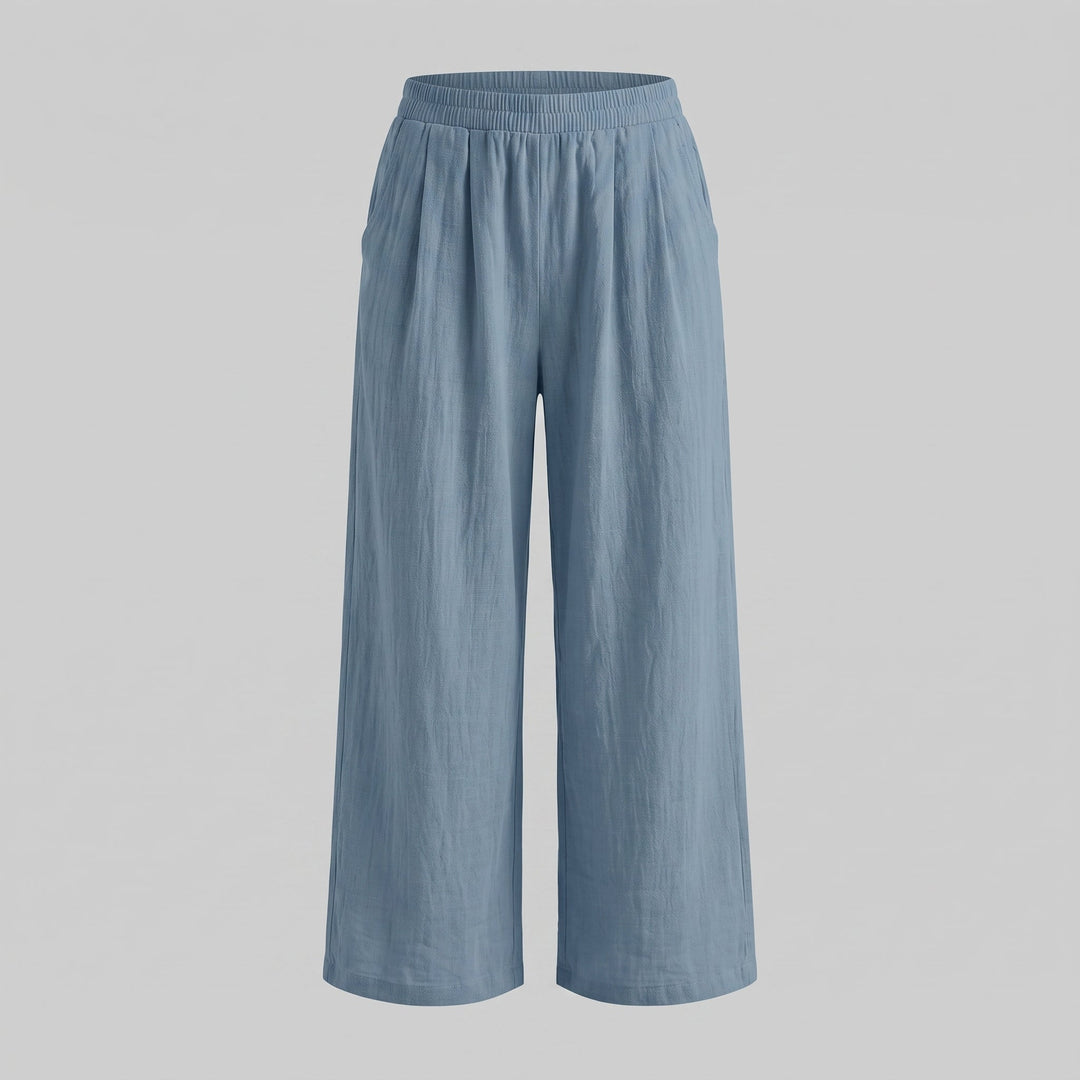 Pantalone palazzo da donna su sfondo neutro, vista frontale completa