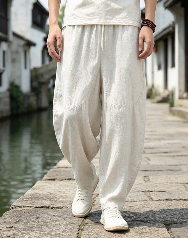 Pantalone in lino da uomo con gamba larga, vita elastica e tasche laterali, vista frontale