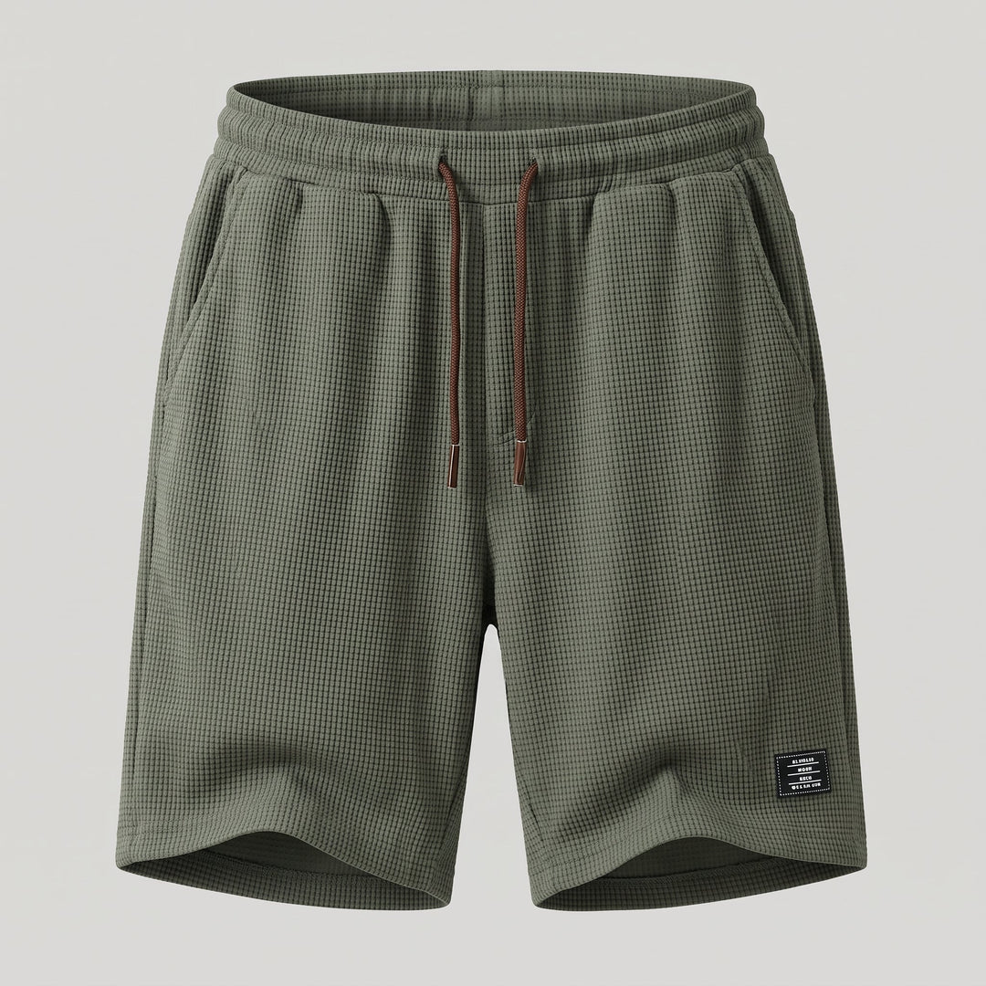 Vista posteriore degli shorts slim fit da uomo con vita elastica